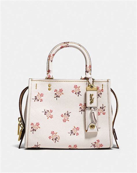 coach rogue floral bow print.